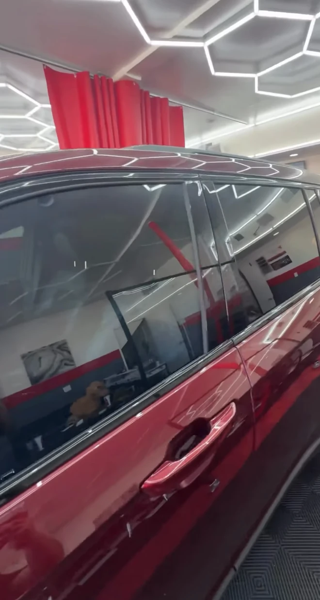 Red SUV after ceramic window tint at Vanish Auto Tints in Van Nuys